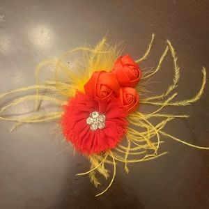 Red and yellow flower & feather hairpiece